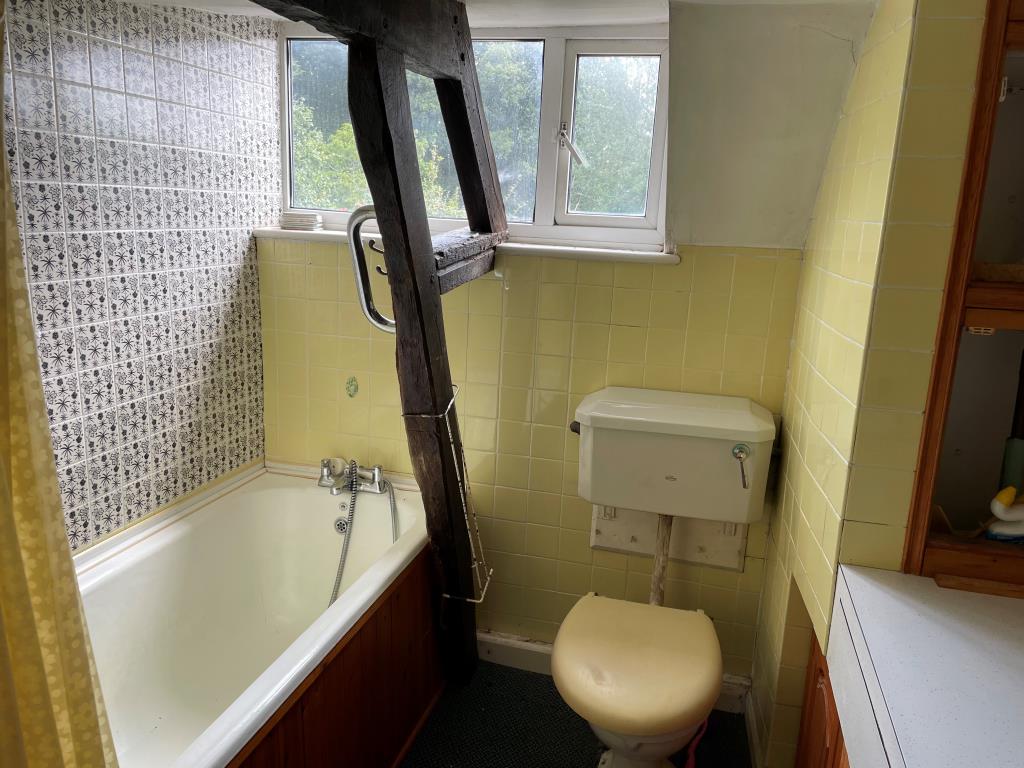 Lot: 69 - CHARACTER COTTAGE IN NEED OF UPDATING AND REPAIR - Bathroom and WC with white suite